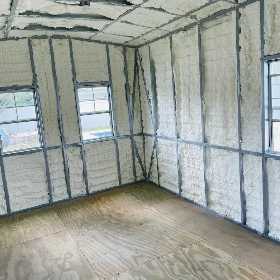 Closed-cell spray foam insulation applied to wall cavities in a residential project in New Rochelle